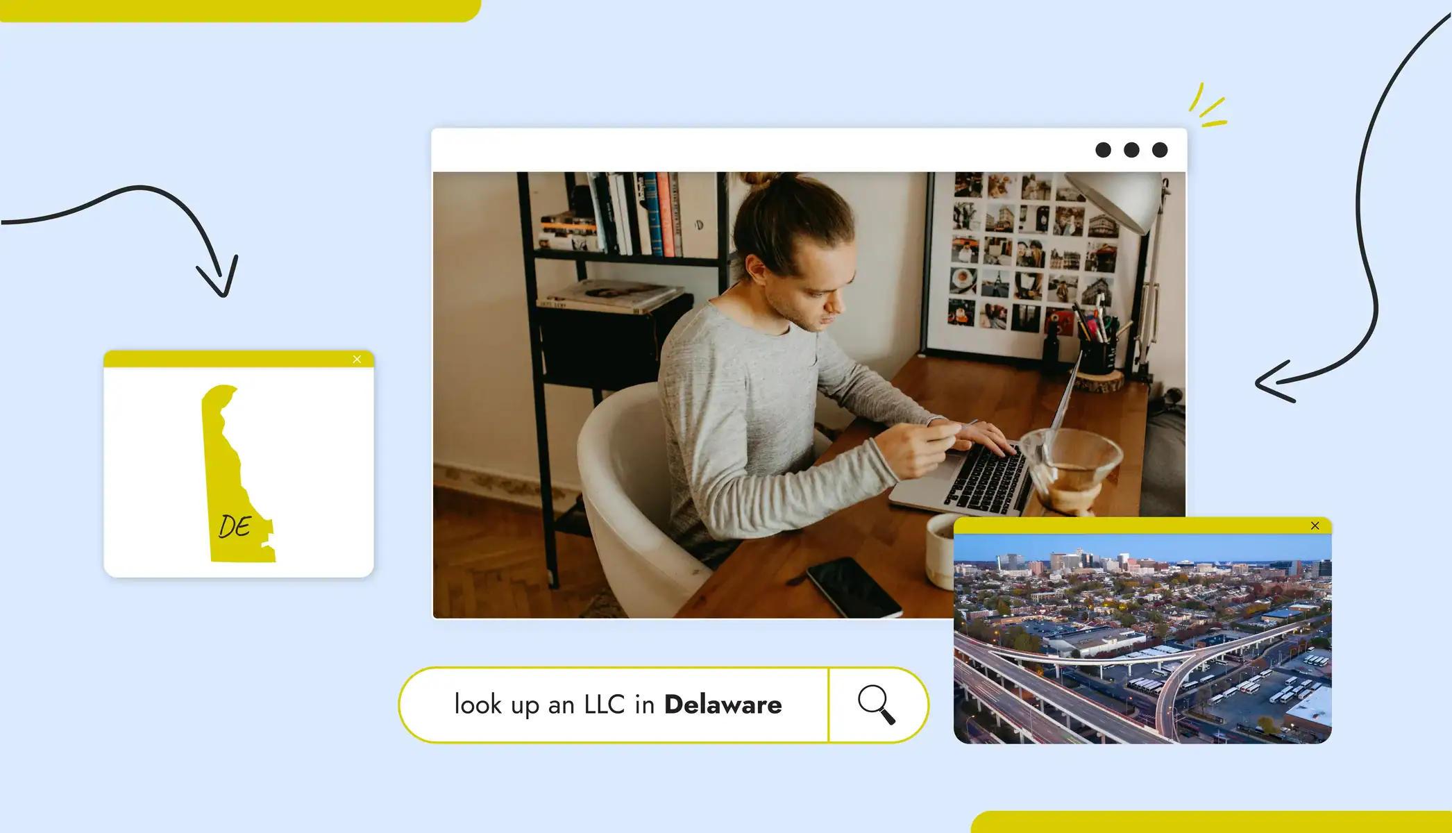 A man sitting at a desk on a computer doing an LLC lookup Delaware state map