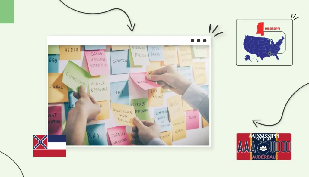 Small business owners adding sticky notes to a board about business strategy in Mississippi 